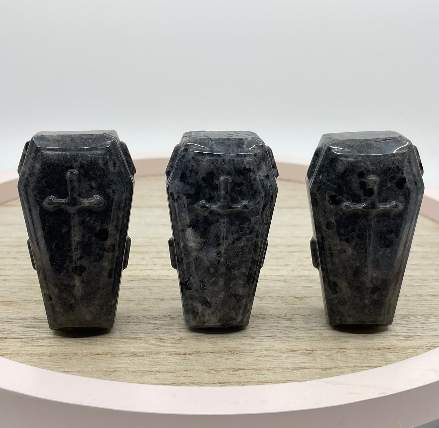 Larvakite Coffin Carving