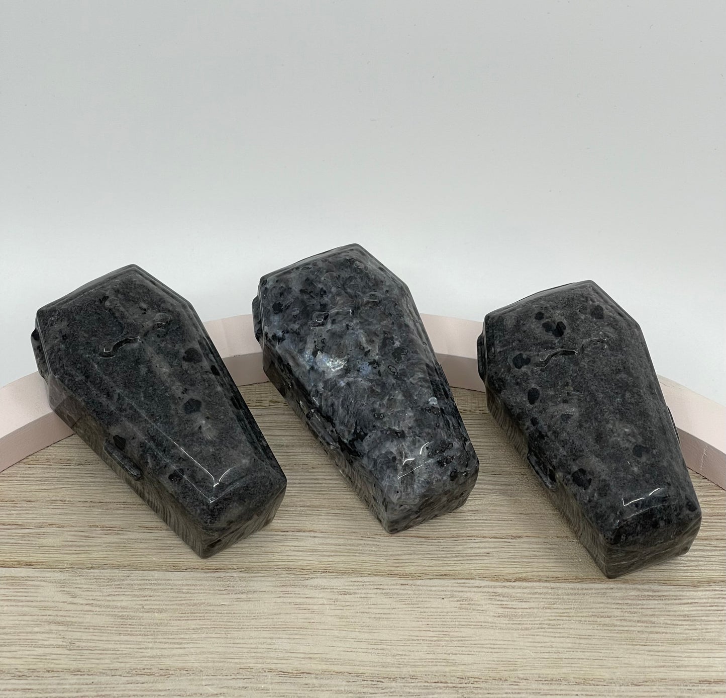 Larvakite Coffin Carving