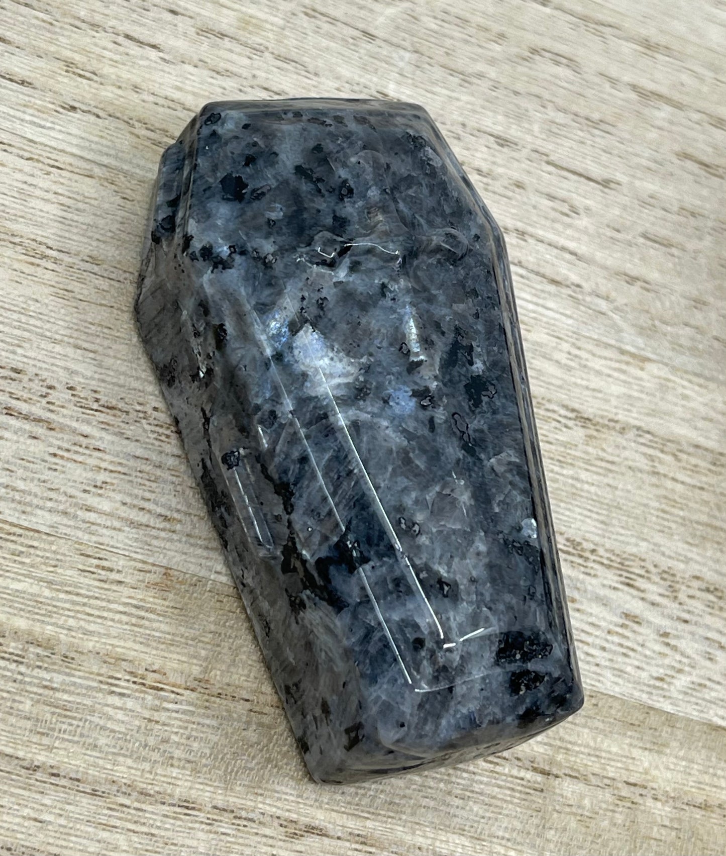Larvakite Coffin Carving